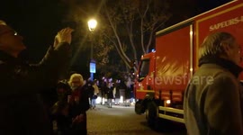 Parisians applaud firefighters following Notre Dame fire