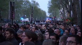 Parisians watch in stunned silence as Notre Dame goes up in flames