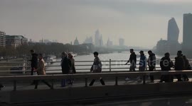 Waterloo Demonstration - people walking across bridge