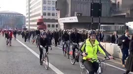 'This is what democracy looks like' - climate change protesters chant as commuters forced to walk across bridge