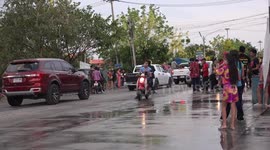 Thai people celebrating Thai New Year in the streets, during their Songkran festival.