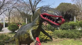 Dinosaur statue made of 3000 abandoned bike tyres at Chinese park