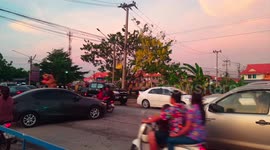 Songkran festival celebrations, all day and into the night, even a dinasour can be seen  joining in the fun.