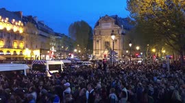Crowd sings as Notre Dame Cathedral burns in Paris