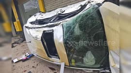 Alleged drunk driver hits and flips car over a row of parked vehicles in China