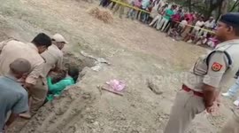 Cops pull out girl alive after she falls inside ditch in northern India