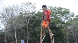 Bizarre race on stilts reaches new heights at hill tribe sports day in the Philippines
