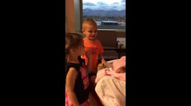 My kids singing to their newborn baby sister at the hospital