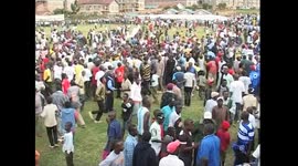 Kenyan football fans break down pitch fence to celebrate victory