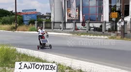 Greek 'Archimedes' inventor makes solar-powered bike