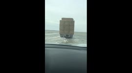Flooding in North Dakota continues as road turns into a 'sea'