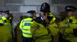 Eco-warrior saved from arrest by fellow climate change protesters at the Extinction Rebellion Parliament Square gig