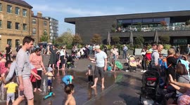 Crowds turn up for splashing in fountains at Coal Drops Yard in Easter sunshine