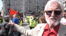 An angry protestor shouting slogans of British Police state, Brexiteer, bribery and fault in Oxford Street