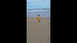 My Adorable son and his first time in the beach