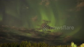 Northern Lights turn Clouds Green in Canada