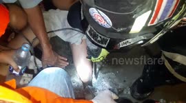 Teenage girl rescued with pneumatic drill after falling down gap in pavement
