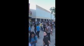 Shoppers pour from building as earthquake hits the Philippines