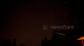 Lyrid Meteor shower visible above rooftop
