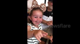 Two-year-old girl's cutest reaction to seeing Donald Duck at Florida's Disney World