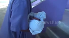 Newborn baby rescued after being dumped in rubbish and 'bitten by ants and mosquitoes'