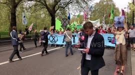 The Extinction Rebellion Parade starts its march along Park Lane