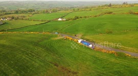 Aerial View of Lorry Crashed Through Hedge