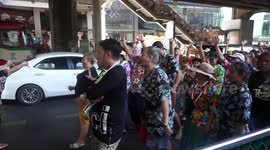 A fun Songran procession near Siam Center, Bangkok
