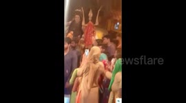 Shocking footage shows moment bull goes berserk and rampages through group of worshippers - stamping on a toddler’s head