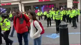Police move in to remove climate change protesters at Marble Arch.