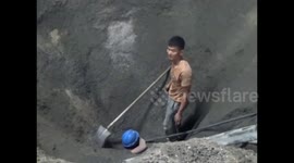 Man buried alive under 4 meters of rubble is rescued by man and machine