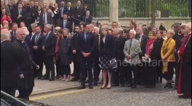 Theresa May and Leo Varadkar leave St Anne's Cathedral after Lyra McKee's funeral service