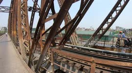 Long Bien Bridge Hanoi, The first longest steel-made bridge retaining. Iconic Landmark of Hanoi, in Vietnam. Motorbike Experience Days