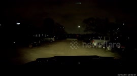 Guy does a ninja move while walking across the driveway