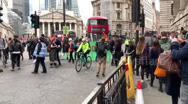 Extinction Rebellion protesters block road outside Bank of England in London