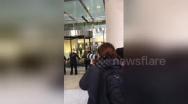 Extinction Rebellion protesters glue themselves to London Stock Exchange
