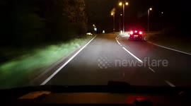 UK driver turns onto roundabout from the wrong side of the road