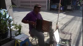 Street Musicians of Thailand - the man with the accordion