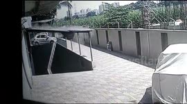 CCTV shows terrifying moment teenage girl survives 12-storey fall