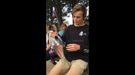kid drink wine from goon sack