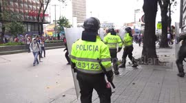 Protesters clash with riot police during nation-wide strike in Colombia