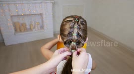 Mother creates amazing Christmas tree braid