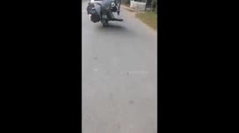 The man carries everything on his motorbike