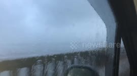 Storm  pounding the small fishing village of fenit co kerry ireland
