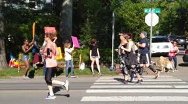 drummer plays for runners passing by in marathon
