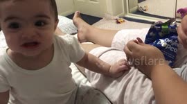 Hungry aussie Baby goes crazy over popcorn