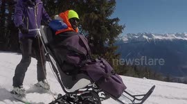 Tandem-sit skier enjoying the slopes at Swiss alpine resort