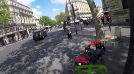 Bike fail in Paris: A man has fallen from his bicycle. Place de la Republique, France. 29 april 2019.(GoPro view from a Paris Velib bike)