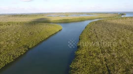 River with Boat entering frame