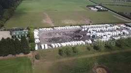 Firefighters tackle huge blaze which destroys more than 70 caravans and motorhomes